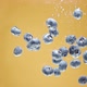 Blueberries Fall and Float in Water - VideoHive Item for Sale
