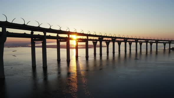 Two-story ZSD Highway and Traffic Cars over the Sea and Sunset Saint-Petersburg, Russia