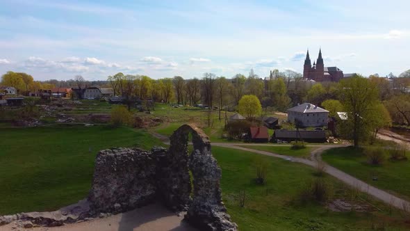 Old Stone Ruins of an Ancient Castle in Rezekne, Latvia. Aerial 4K Dron Shot