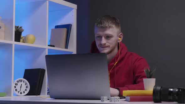 Sleepy Handsome Man in Casual Clothes Talking on Webcam, Yawning, Overwork