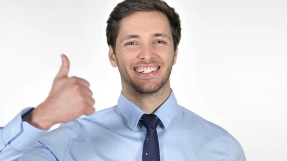 Thumbs Up By Young Businessman on White Background