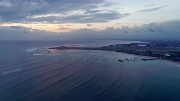 Evening Aerial View Of The Ocean And Dramatic Clouds
