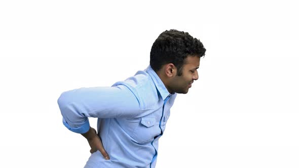 Man Suffering From Backache on White Background