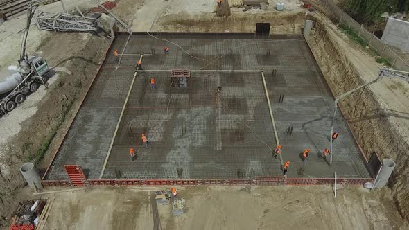 Construction Workers Work in Preparation for Binding Rebar and Concrete Work