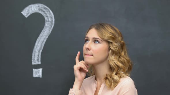 Question Mark Written on Blackboard, Pensive Woman Thinking, Making Decision