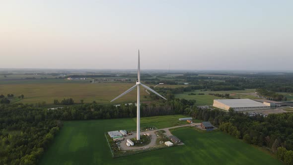 Aerial footage of Lonely windmill renovable energy source, sustainable living alt