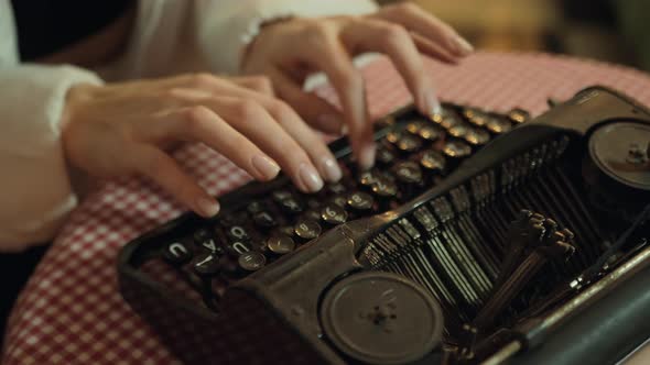 Secretary at Old Typewriter