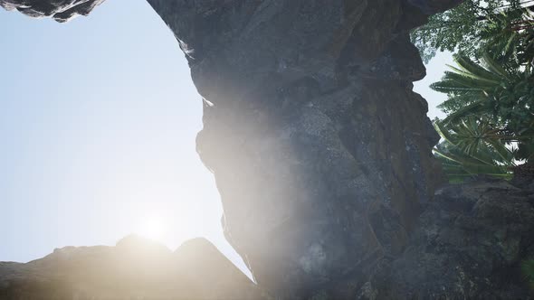 Vertical Shot of Tropical Cave at Sunset