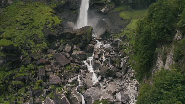 Aerial view of an amazing waterfall in Cevio, Ticino, Switzerland.