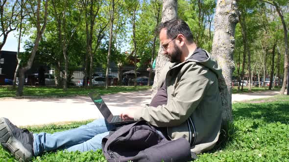 Working in Park with Computer