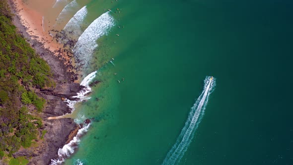 Aerial View Of Person Jet-skiing In Tropical Beach Of Noosa National Park Near Noosa Heads In Queens