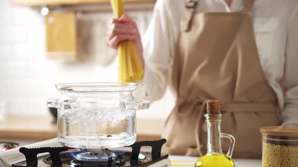 The Hostess Of The House Prepares Pasta, Cooking Pasta, Pasta At Home