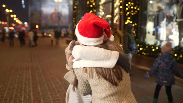 Portrait of Happy Cute Young Friends Hugging Each Other