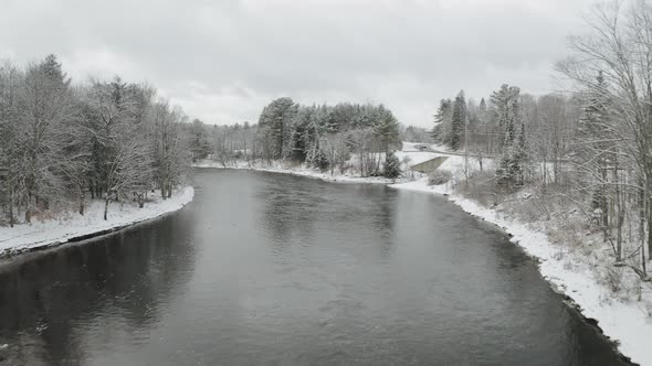 Aerial shot from drone that runs along river Piscataquis. Maine. USA.