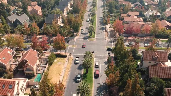 Ascending Aerial Drone Shot of intersection in residential area