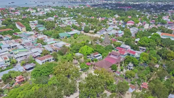 Aerial View Tropical City with Buddhist Temple Complex