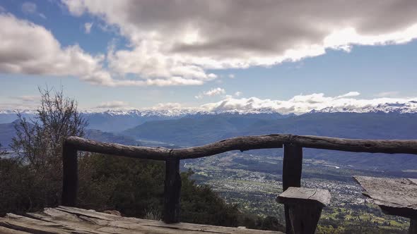 Pan right timelapse of El Bolsón valley covered in clouds from Piltriquitron Hill panoramic point, P