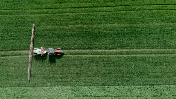 Tractor Spraying Field Aerial footage