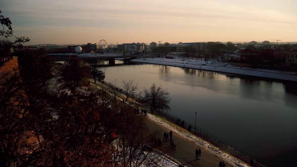 Cracow cityscape in winter in Poland near vistula river during sunset sunrise