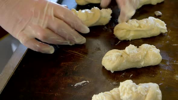 Confectioner Making Pastries at Bakery