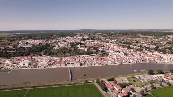 Stunning cityscape of Alcacer do Sal, Portugal. Aerial pull out