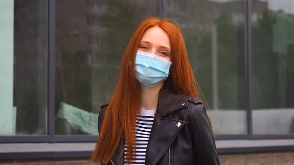 Redhaired Ginger Woman Washing Trolley Antiseptic and Wearing Gloves