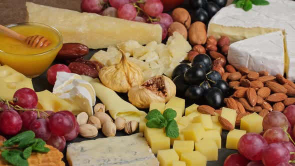 Cheese plate with camembert brie parmesan maasdam dutch cheese