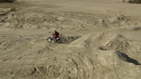 Enduro Motorcycle Rides Offroad on the Sands