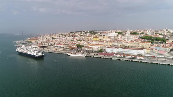 Fly above River Tejo with City of Lisbon in the Background