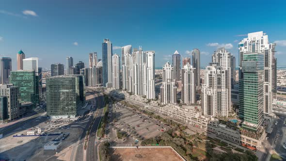 Modern Residential and Office Complex with Many Towers Aerial Timelapse at Business Bay Dubai UAE