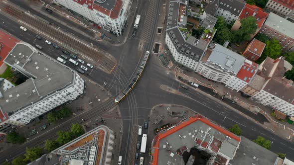 Aerial View of Tram Passes Through Intersection on Rosenthaler Platz