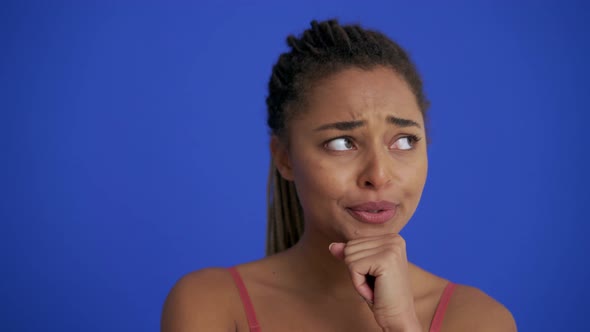 African sad woman with braid hairstyle worrying about something