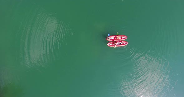 Friends having fun in canoe on Mreznica river, Croatia