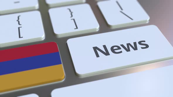 News Text and Flag of Armenia on the Keys of a Keyboard