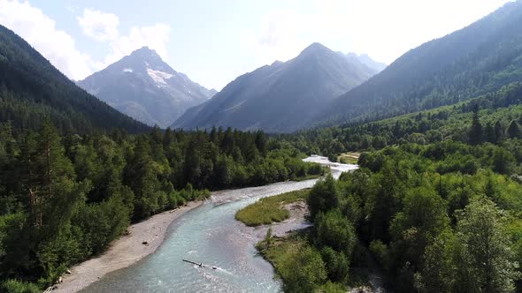 Mountain River with Clear Water on the Background of the Forest Aerial View