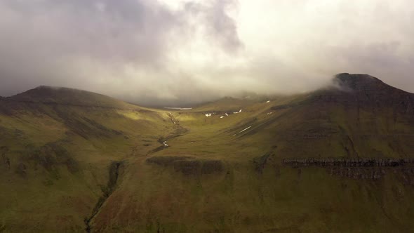 Drone Flight Over Rolling And Mountainous Landscape