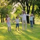 Woman with Children Running in Park - VideoHive Item for Sale