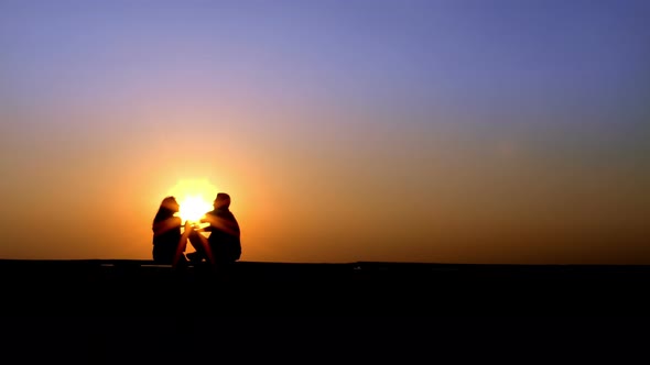 Couple Lovers In Sunset Silhouette 1