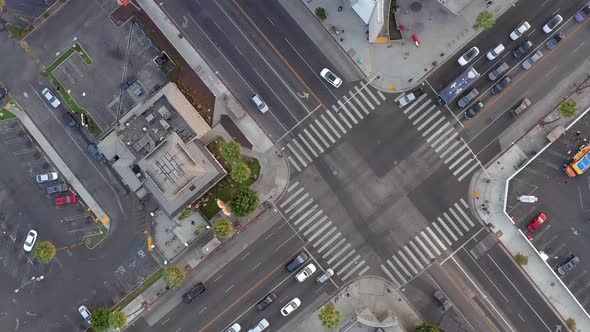 Aerial, above view of people driving in the city, drone view