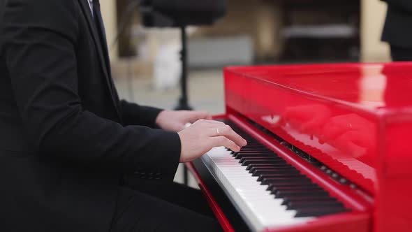 Pianist Plays Beautiful Red Grand Piano