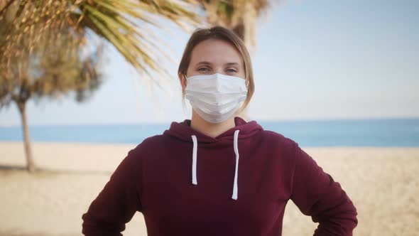 Portrait of Woman Wearing Face Mask Standing Outdoors