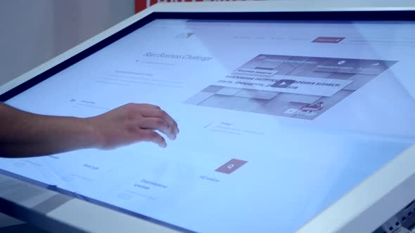 Person Works on a Large Screen Sensor