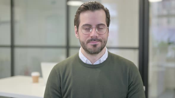 Portrait of Young Businessman Showing No Sign By Finger Denial