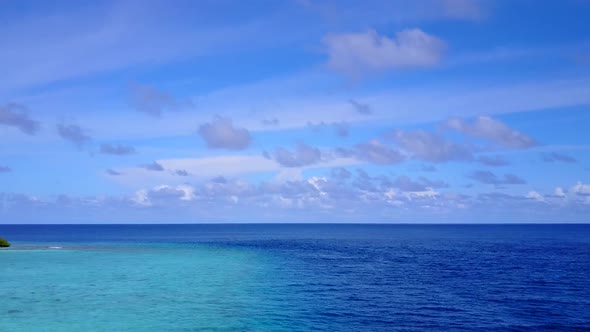 Aerial drone seascape of coastline beach time by blue lagoon and sand background