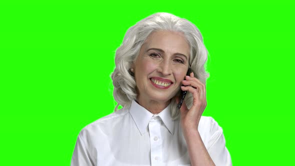 Smiling Mature Woman on Green Screen Background