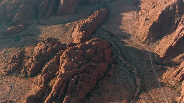 Aerial at sunset of gold crested rocks in Snow Canyon Sate Park (Utah).