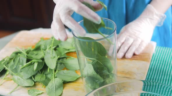 Chef Throws Spinach in the Blender Bowl