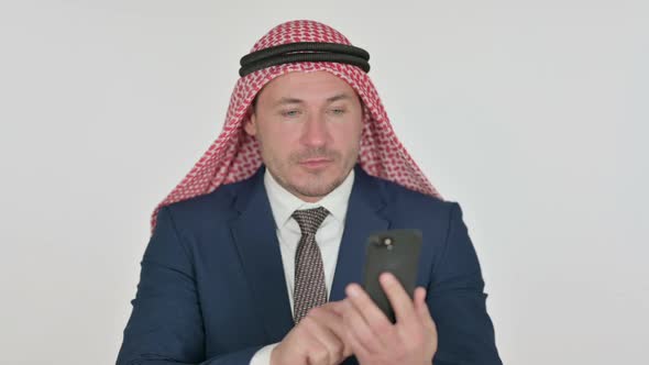 Arab Businessman using Smartphone, White Background