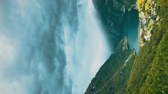 Vertical Video Timelapse Geirangerfjord Norway  Geiranger In Geirangerfjorden In Sunny Summer Day