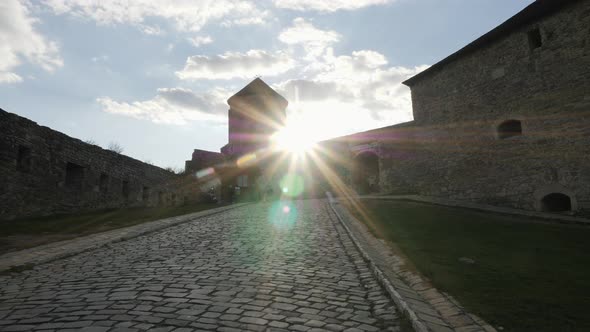 Sun shining at Kamianets-Podilskyi Castle